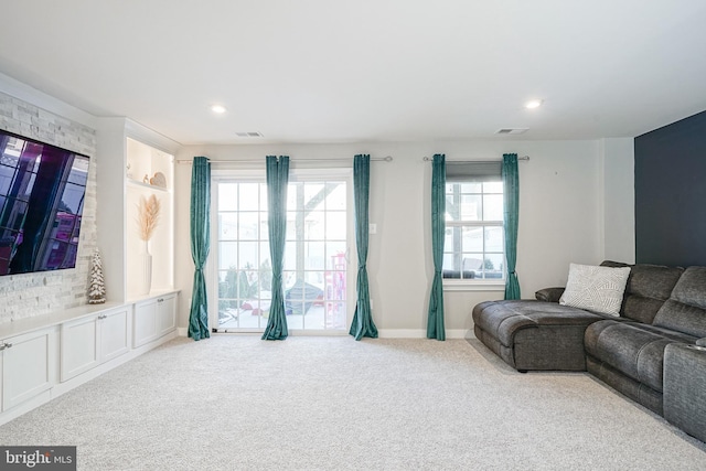 living room with light colored carpet