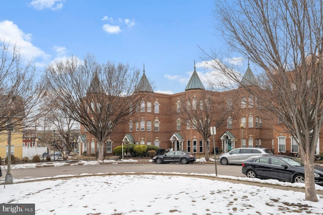 view of snow covered property