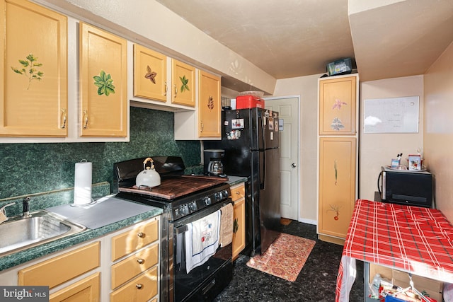 kitchen featuring sink, decorative backsplash, light brown cabinetry, and black appliances