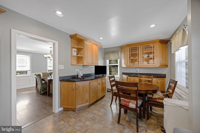 kitchen with a notable chandelier