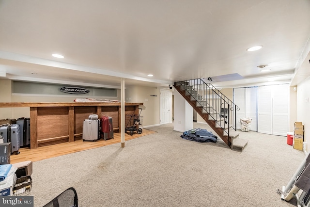 exercise room with carpet flooring and bar area