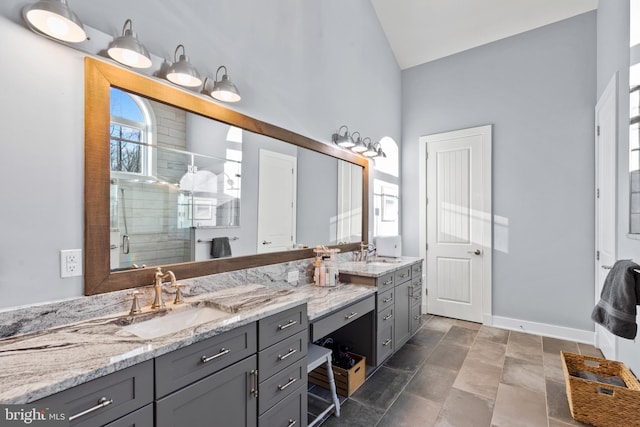 bathroom featuring vaulted ceiling, walk in shower, and vanity