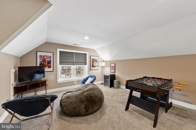 game room featuring lofted ceiling and carpet flooring