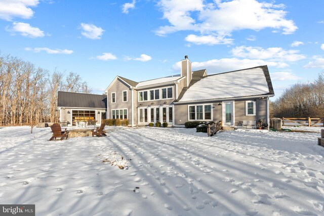 view of snow covered property