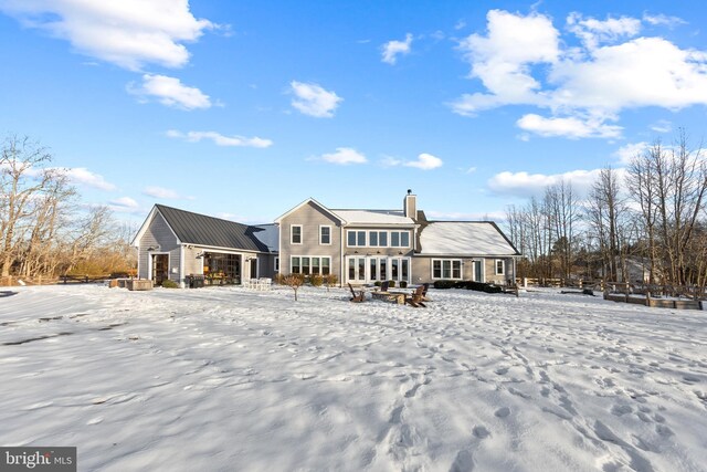 view of snow covered property