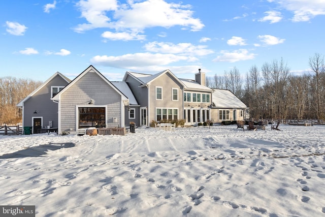 view of snow covered property