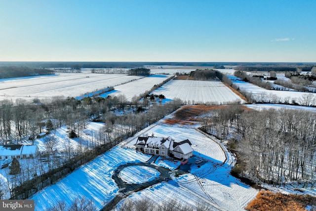 snowy aerial view with a rural view