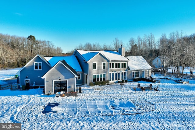 view of snow covered property