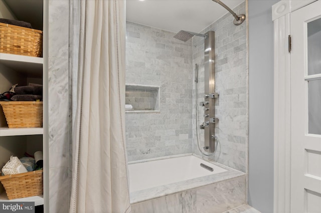 bathroom with shower / bath combo