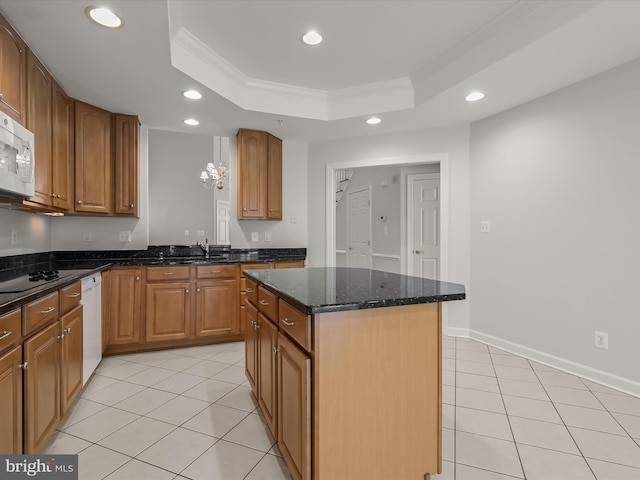 kitchen with crown molding, white appliances, light tile patterned floors, a raised ceiling, and recessed lighting