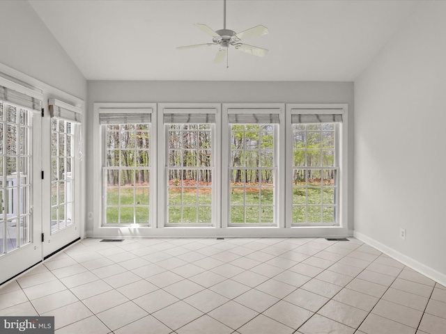 unfurnished sunroom with a healthy amount of sunlight, french doors, and visible vents
