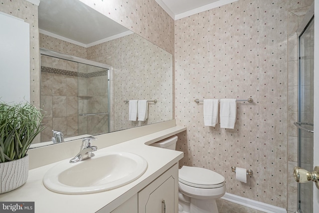 bathroom with toilet, tile patterned floors, crown molding, an enclosed shower, and vanity