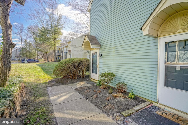 exterior space featuring a lawn