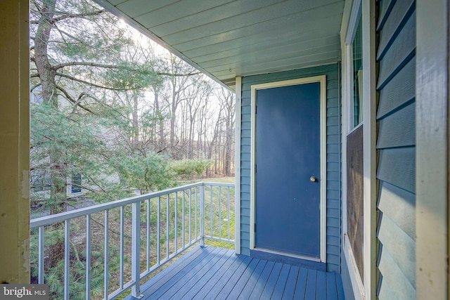 entrance to property with a balcony