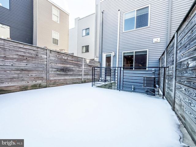 view of yard covered in snow