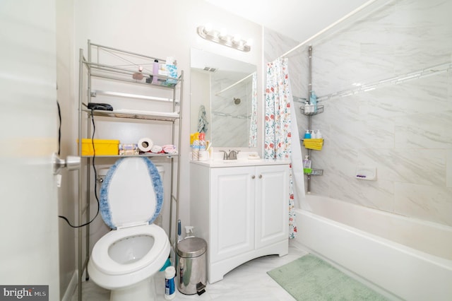 full bathroom featuring shower / tub combo, vanity, and toilet