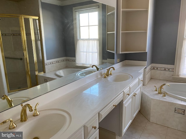 bathroom featuring shower with separate bathtub, vanity, tile patterned floors, and crown molding