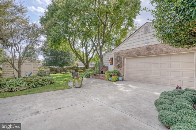 garage with a lawn