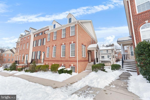 view of snow covered building