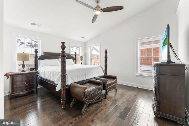 bedroom with dark hardwood / wood-style floors, ceiling fan, and lofted ceiling