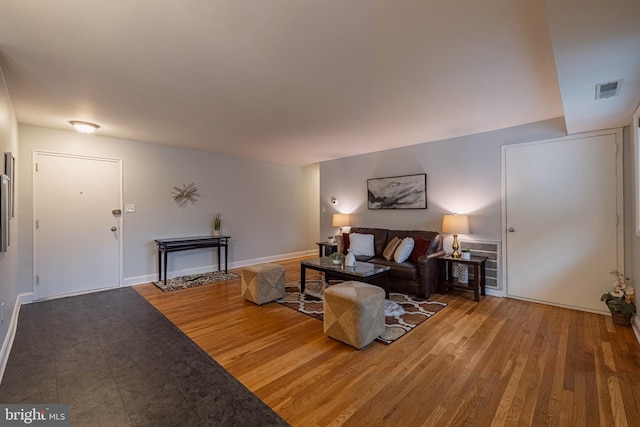 living room with hardwood / wood-style floors