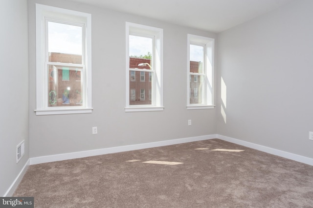 view of carpeted spare room