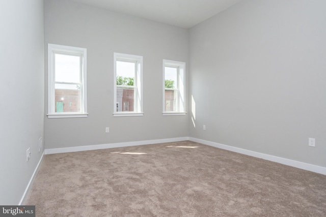 view of carpeted spare room