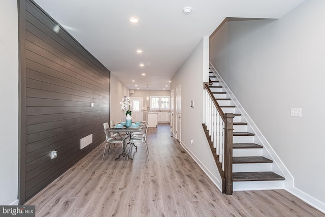 foyer entrance with light wood-type flooring