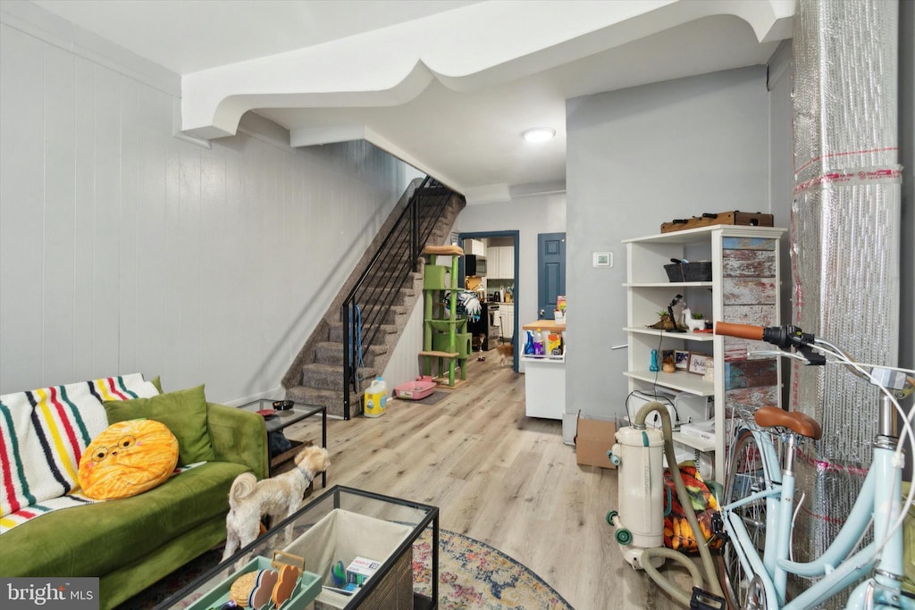 living room with light hardwood / wood-style floors