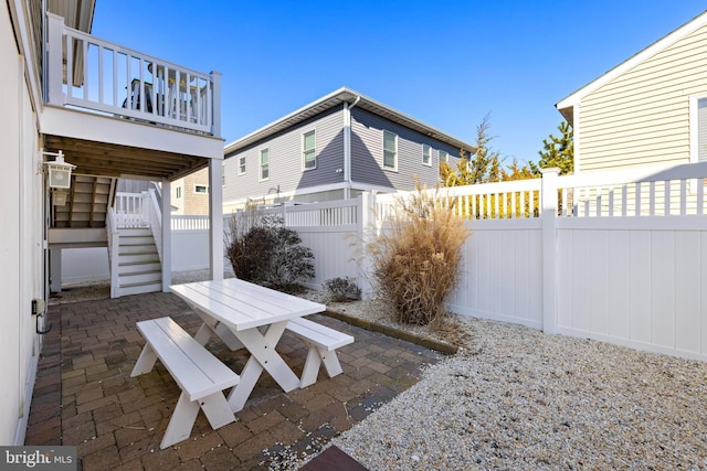 view of patio with a wooden deck