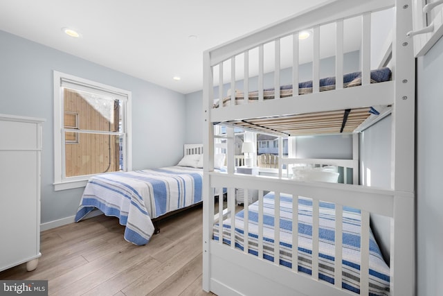 bedroom featuring light wood-type flooring