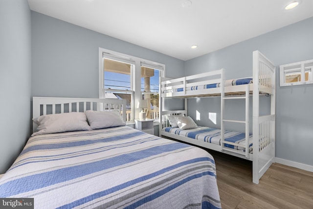 bedroom with wood-type flooring