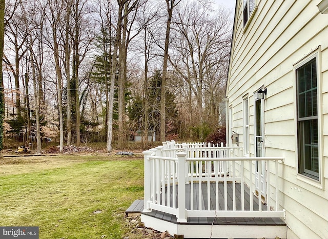 view of yard with a wooden deck