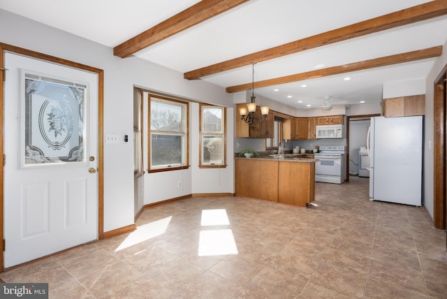 kitchen with beamed ceiling, white appliances, a peninsula, brown cabinetry, and baseboards