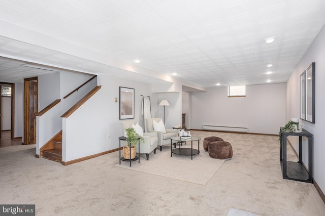 living area featuring a baseboard heating unit, baseboards, carpet, stairs, and recessed lighting