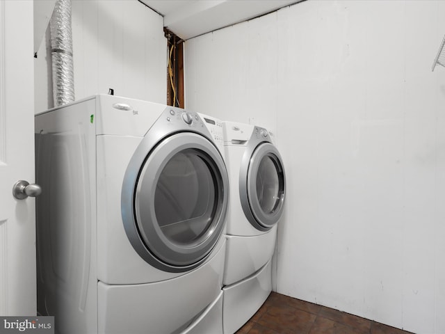 laundry room featuring washing machine and dryer