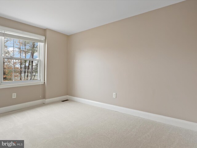 view of carpeted spare room