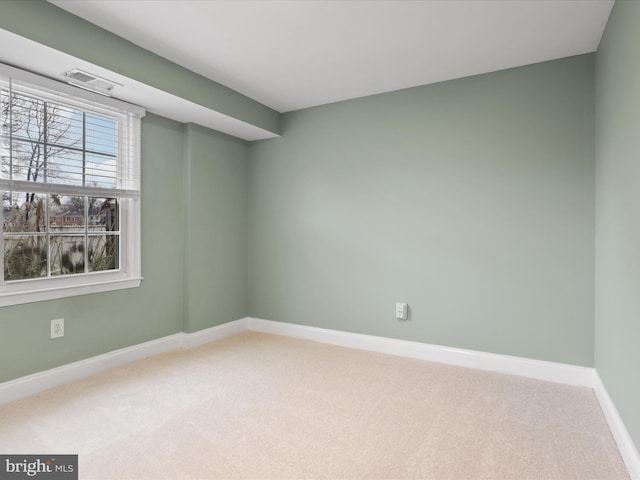 view of carpeted spare room