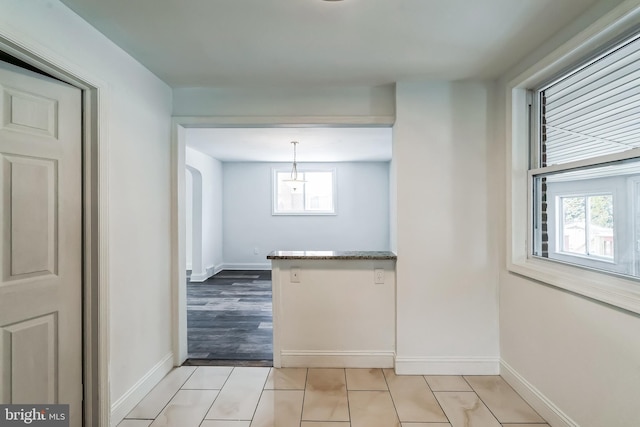 interior space featuring light tile patterned floors