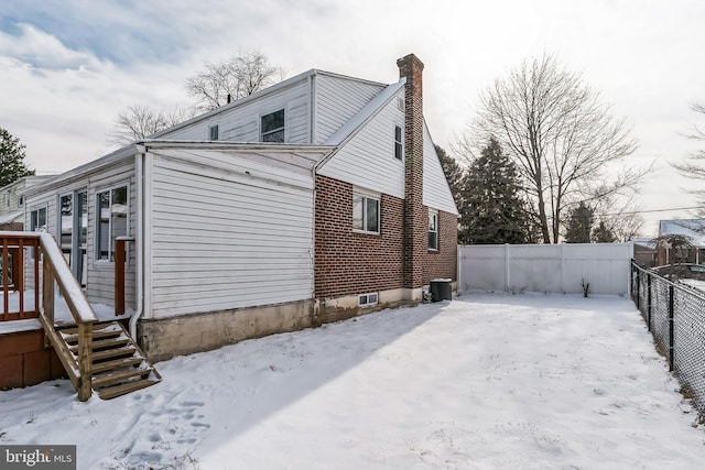 view of snow covered property