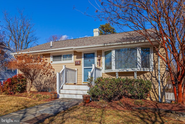 view of front of house with a front yard