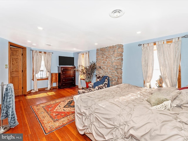 bedroom with wood-type flooring