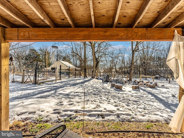 view of snow covered patio