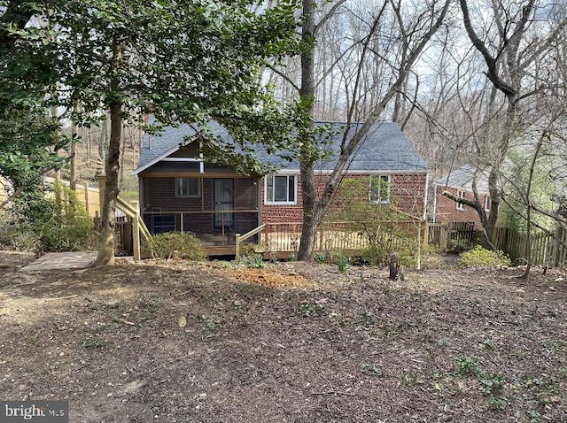 view of front of home with a wooden deck