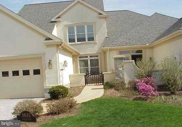 property entrance with a garage