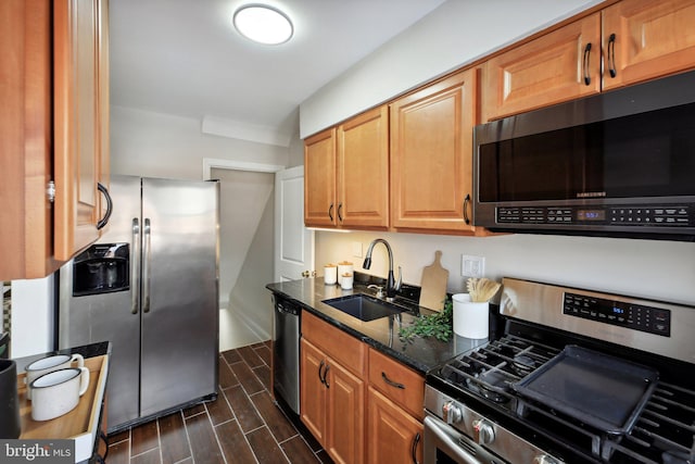 kitchen with appliances with stainless steel finishes and sink