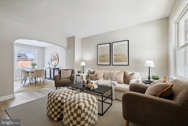 living room with light hardwood / wood-style flooring