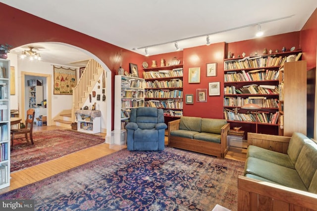 sitting room featuring wood-type flooring