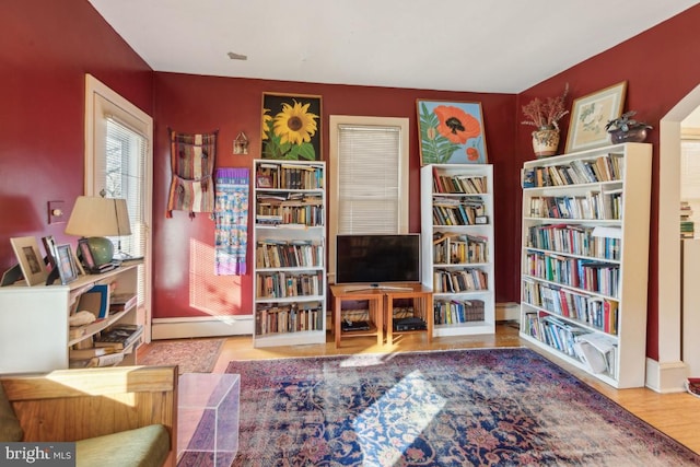 living area with light hardwood / wood-style floors