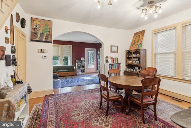 dining space featuring hardwood / wood-style flooring